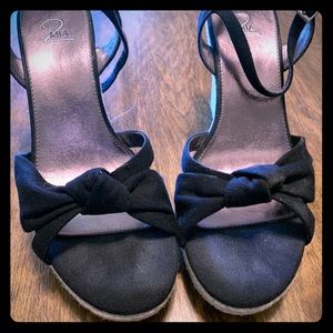 Like new pair of MIA wedge sandals!